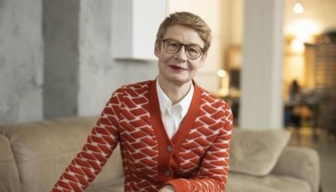 Regula Lüscher, Senate Building Director of Berlin, sitting on a sofa